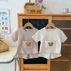 Ensembles de vêtements 2023 NOUVEAU EN SUMBRES GABLES BÉBRANS GUBLES BARCHES COURRAISE Waffle Big Pocket Bear Top T-shirts Short Enfants