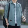 Camicia da lavoro casual da uomo a manicotto estivo per il quarto estivo da uomo per la versione da uomo della versione coreana di abbigliamento da uomo 1/2