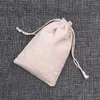 Storage Bags 500pcs/ Lot Custom Personalized Gift Pouch Cotton Drawstring Bag Natural Color Packaging Small Cloth