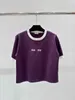 Koszulka damska projektantka kontrastowa kolor kolor haftowany toencel krótkie rękawowe koszulka na wczesną wiosnę New Age redukującą modę wszechstronną top Ankr