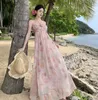 Vestidos informales Vintage Pink Floral Impresiones para mujeres Elegantes División sin espalda Long Summer sin mangas una línea de vestir de vestir plisado