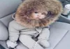 Fooes Raccoon Fur Baby Rompers Vêtements d'hiver à capuche Born Bord Girl Tricoted Sweater Jumpsuit Kid Toddler OUTERWEA298P3325363