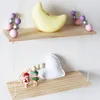 Plaques décoratives Décoration mignonne Nordic Kids Room Es étagère en bois avec des vêtements de perle de planche Perles de bois de bois créatives étagères pour cadeaux