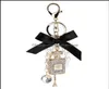 Keychains Fashion Accessories Creative Handmade Diy Diamond per flaska Alloy Bow Pearl Luxury Keychain Pures Charm Pendant YS068 7744674