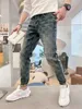 Designer Jeans for Mens Autumn/Winter New Jeans Trendy Brand Gedrukt Gedrukt kleine rechte beenbroeken voor jeugdmodebroek