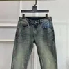 uomini jeans designer pantaloni maschile tasche primaverili lettere di denim pantaloni lavati jeans dritti pantaloni di alta qualità