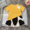 Frauen T-Shirt Jungen Mädchen Mädchen Anzug runden Hals kurzärärmisch mit mesh schwarzweißen Shorts für lässige Mode