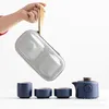 Ensembles de voies de thé Travel Tea Set Retro Ceramic Black Pottery Portable Cup One Pot Two Tasse de ménages Téapot Maison Small Gift Kungfu