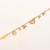 Braccialetti classici Bangle di alta qualità in oro inossidabile Lettera di fiori in acciaio inossidabile Pendenti amanti regalo per cuffia da polso da braccialetto per regali di compleanno per regali di compleanno