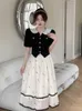huangFrench Flesh Covering Skirt Set for Womens 2024 Summer Doll Neck Age Reducing Casual Fashion Two Piece Set