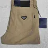 Projektant dżinsów męskich Nowy wiosna/lato cienki Casual Slim Fit Black High End Trenda marki elastyczne wszechstronne małe spodnie azjatyckie Rozmiar 28-42 R4QV