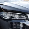 F15 2014-2018の新しいカーヘッドライトヘッダー保護装飾ステッカーブラックランプフードアクセサリー