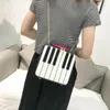 Umhängetaschen Frauen Klavier Keyboard Square Marke kleine Klappen für Damen weibliche Luxusdesignerin Messenger -Tasche 2024 Freee