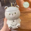 Tazze creative cartoni animati personalità corona orso tridimensionale tazza in ceramica tazza di caffè simpatica 3d con cucchiaio di coperchio che beve latte