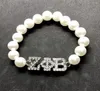 Strand Rhinestone ingelegde Griekse letter ZPB metaallabel BUID Zeta Phi Beta Sorority Society Sieraden Simulatie Pearl kralen Bracelet1873527