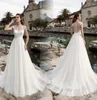 Sexy Beach Suknie ślubne Tiulle Scoop Surk Sheer Button Back Rleevele Sweet Train Bridal Suknia Szata de Mariee 20197619488