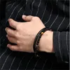 Pulseiras naturais de pulseiras de couro genuíno pulseiras trançadas pretas em aço inoxidável garra de pegador de peito de pegada de peito