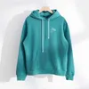High quality designer clothing The right autumn winter water lake blue brooch shows white lazy wind American hooded sweater trend
