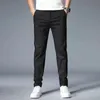 Summer Ultra-Thin Mens Casual byxor Slim Straight Elastic Ice Silk Sports Jogging Pants Fashion Korean Black Khaki Green 240408