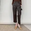 Pantalones de mujer cuero genuino para otoño e invierno 2024 estilo de desplazamiento urbano con diseño de cintura elástica bolsa de inserción inclinada