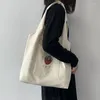 Evening Bags Tas Belanja 2024 Wanita Seri Cetak Pola Teks Beige Tote Fashion Kapasitas Besar Sederhana Komuter Harajuku Dapat