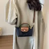 Hobo högkvalitativa skalväskor för kvinnor 2024 Brand axelväska lyxväskor och handväskor designer crossbody söt liten satchel