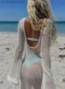 Grundläggande casual klänningar Long Slve Knit Beach Dress Women Sexy S Through Slim Maxi Dress Summer Elegant Solid Backless Long Dress Holiday Outfit 2024 1 T240415