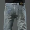 Designer pour hommes Jeans Men's End Fit Small Foot Brand Double Youth Pants Pantalon de mode