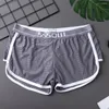 Sous-pants Sexy Ice Silk Men Boxer Shorts et Mesh Breathable Comfort Briefes sans couture Pouche sous-vêtements Trunks Glossy Pottel