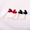 Boucles d'oreilles Stud Style coréen affluqué Love Long Pendant Pendant pour les femmes Design de niche de tempérament de tempérament de la mode automne et hiver