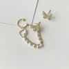 Boucles d'oreilles en peluche coréen élégante mignonne en strass de papillons pour femmes pour les filles fashion chaîne d'oreille de chaîne d'oreille bijoux nets n2ue