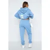 Designer White Women Tracksuits Suit Due pezzi Set di sudorazione Autumn Female con cappuccio con cappuccio con cappuccio con la felpa signore salti sciolti abiti da donna