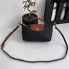 Moda Bolsa de alta qualidade Bolsa barata loja de longa loja móvel couro genuíno por atacado Purse preta luxo 2024 mini bolsas de massa campeões de nylon