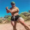 Byxor män fitness kroppsbyggande shorts gym