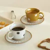 Muggar europeiska vintage kaffekopp keramik och tefett eftermiddag te högklassig delikat ljus lyxig högkänsla latte