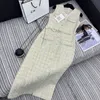 Designer di abiti casual di base primaveri primaverilo New Ch Nanyou Sociali di alta gamma, cintura a catena riducente e versatile, giubbotto a V-Neck Mid Long Long 2ij1