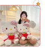 En gros de la fraise mignonne chat en peluche jouet enfants jeu jeu jeu de jeux de vacances à la machine à griffe de vacances Prix de 45 cm