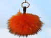 Keychains y echter Pelzballschlüsselkette Puffhandwerk DIY Pompom Black Pom Keyring UK Charme Frauen Bag Accessoires Geschenk2685459