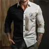 Camisas casuais masculinas 2024 retalhos de retalhos pretos e brancos com mangas compridas de mangas compridas moda bola de lapela de vestuário