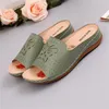 Hausschuhe Römische Stil Frühlings- und Sommersandalen für Frauen Mode Ladies Flat Hollow Out Hakenschleife Keilblütenschuhe