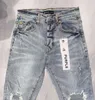 Nowa wysokiej jakości fioletowa marka 1 1 2024 Slim Fashion Jeans High Street Raped Old Dżinsy