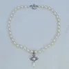 レトロラグジュアリーサターンチャームイヤリングデザイナーパールイヤリング水滴形の真珠のネックレス