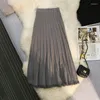 Spódnice jesienne zimowe dzianiny plisowana długa spódnica kobiety elastyczne wysoką talię A-line w paski Sweter Tassel Mid-Calf