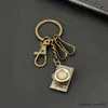 Keychains Lonyards Wannee Fashion Mini Retro Retro Bronze Metal Car Chain Multi Cameras String Elemch Keynchain Men Pendant Creative Gift Bijoux