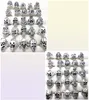 Lot en vrac entier 100pcs styles top mix bancs de crâne squelettes bijoux men039 cadeau de cadeau favori des hommes de biker marque de bijoux homme 5736403