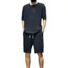 Herren-Trainingsanzüge 2-teiliger Sommer-Freizeitanzug O-Neck Kurzärärmelte T-Shirt Elastic Drawess Taille Bag Weitbein Shorts