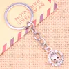 Keychains 20pcs mode Keychain 15 mm Circle Skull Squelette Love Pendants Diy Men Bijoux Car Key Chain Chain Ring Holder Souvenir pour cadeau