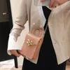 Sac fourre-tout Mini 2024 Spring Fashion Quality Kelly Designer's Designer Handsbag Lock Chain épaule Messenger Messenger