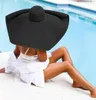 Chapéus de praia de 70 cm de 70 cm de diâmetro largo largo chapéu de sol preto para mulheres Proteção UV Chapéu de palha dobrável grande hat178c9261818