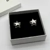 Mode 925 Sterling Silver Small Star Shape Ear Stud Earrings 18k Guldpläterade öronsmycken för kvinnor